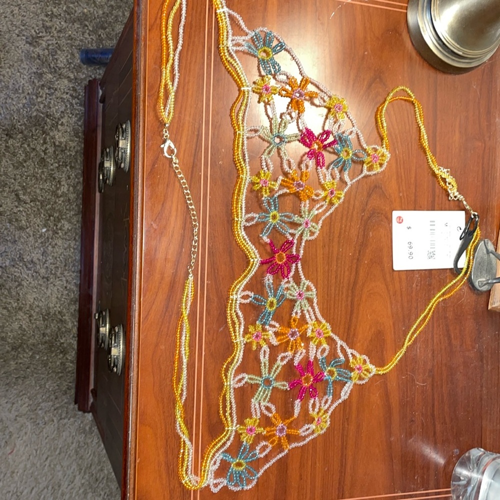 A NWT  Zaras multicolored floral beaded top.